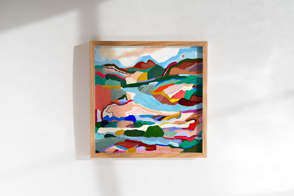 A colorful abstract landscape painting by Marina Ester Castaldo